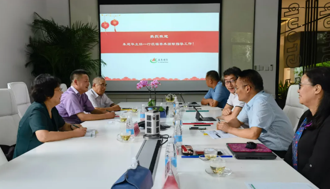 上海市农业技术推广服务中心朱建华主任一行莅临爱游戏ayx官网平台国际指导工作